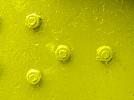 yellow bolt with a nut
