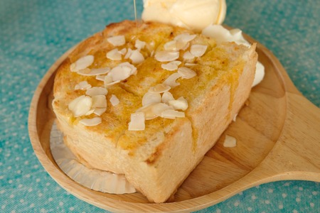 toast bread and ice cream on wooden dishの写真素材