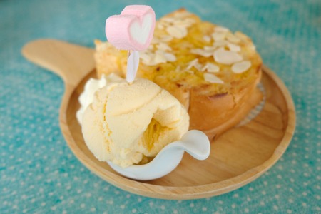 toast bread and ice cream on wooden dish
