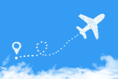 plane shape clouds flight route with start point and dash line traceの写真素材
