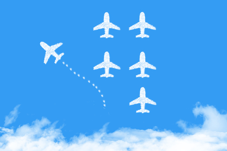 plane shape clouds changing direction ,new ideas, different business conceptsの写真素材