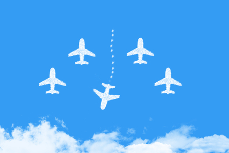 plane shape clouds changing direction ,new ideas, different business conceptsの写真素材