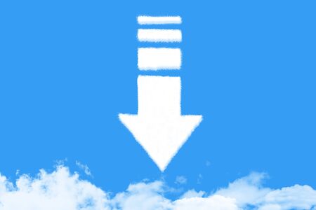 Arrow shaped cloud on blue skyの写真素材