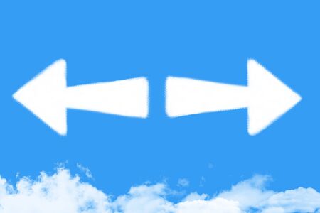 Arrow shaped cloud on blue sky