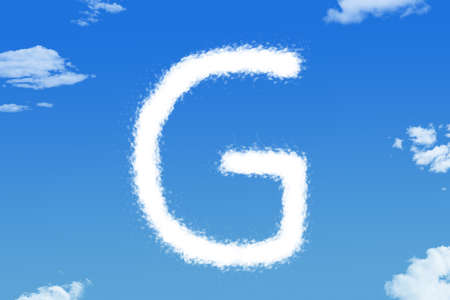 Letter G cloud shape on blue skyの写真素材
