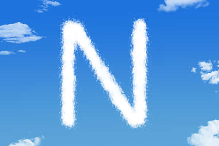 Letter N cloud shape on blue skyの写真素材