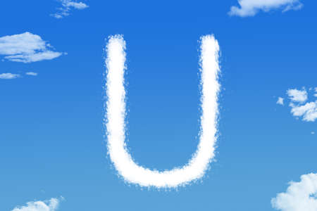 Letter U cloud shape on blue skyの写真素材