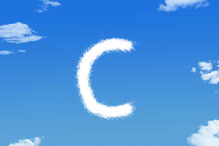 Letter c cloud shape on blue skyの写真素材