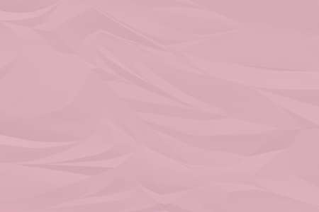 crumpled pink paper background close upの写真素材
