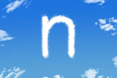 Letter n cloud shape on blue skyの写真素材