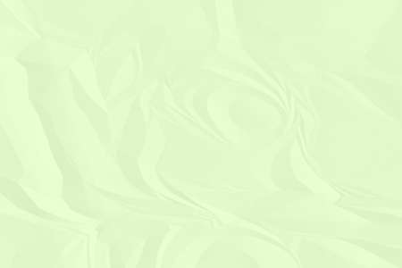 crumpled green paper background close upの写真素材