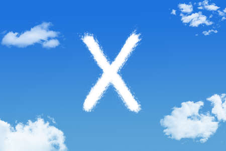 Letter x cloud shape on blue skyの写真素材