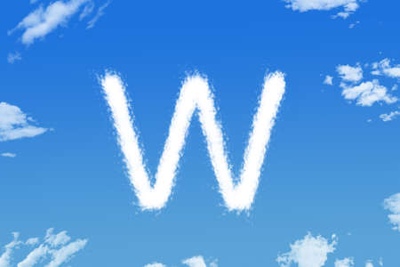 Letter w cloud shape on blue skyの写真素材
