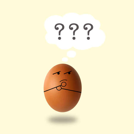 egg thinking on yellow background,3D illustrationの写真素材