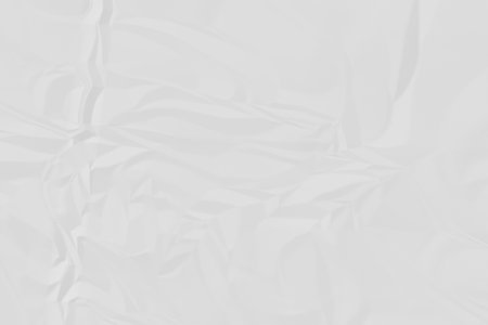 crumpled white paper background close upの写真素材