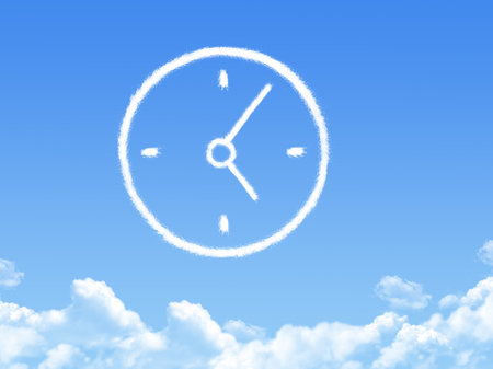 wall clock cloud shape on blue skyの写真素材