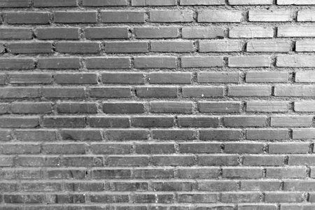 Black brick wall texture backgroundの写真素材