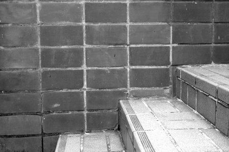 Black brick wall texture backgroundの写真素材