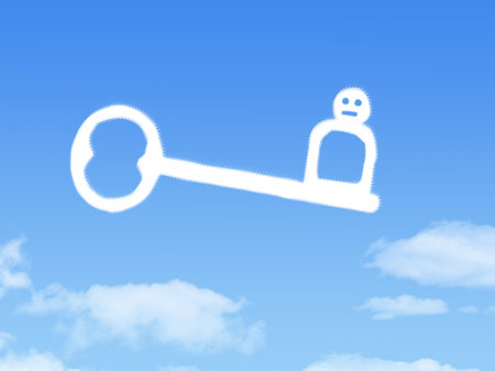 key to user shape clouds , business concept on blue skyの写真素材