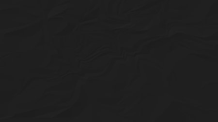crumpled black paper background close upの写真素材
