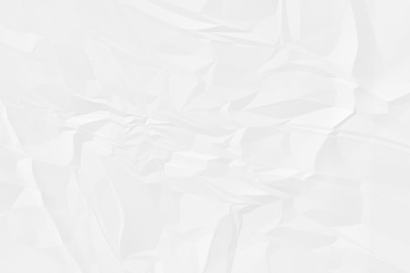 crumpled white paper background close upの写真素材