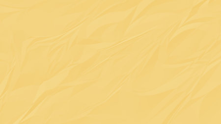 crumpled yellow paper background close upの写真素材