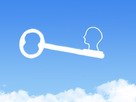 key to user shape clouds , business concept on blue skyの写真素材
