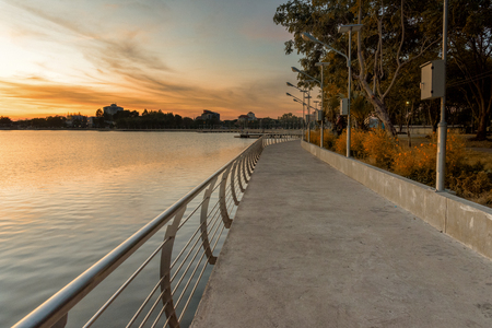 walkway on cemen brifge with stainless steel Barrier in sunriseの写真素材