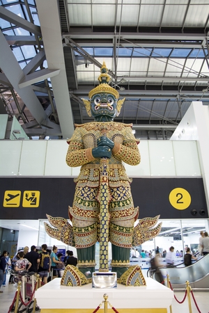 BANGKOK, Thailand - February 10, 2016 : Suvarnabhumi International Airport serves tourism travelling in and out of Thailand and Guardian Statute in the Departure Hallのeditorial素材