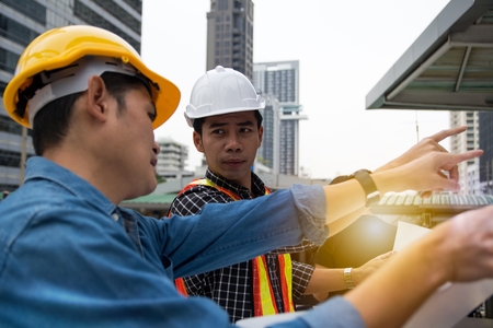 Coworkers of engineer discussing the moving forward planの写真素材