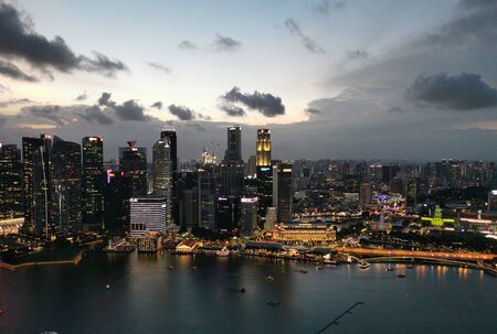 Singapore - January 26, 2020 : Singapore skyscrapers at night. Singapore is an island city-state in Southeast Asia.  Singapore City Scape at the night at Mairna Bay.のeditorial素材