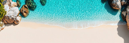 This stunning aerial view showcases a peaceful tropical beach, featuring crystal clear turquoise water and soft sand. Ideal for travel themes.の素材