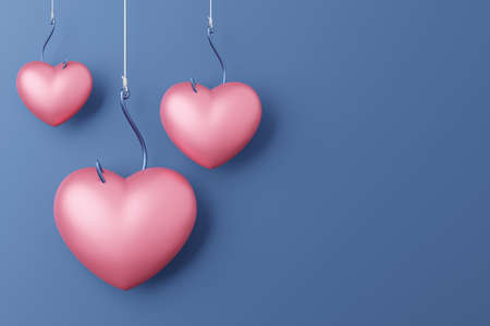 Hanging Heart symbol 3D rendering pink color with fishhook, Valentine's Day fall in love concept design on blue background with copy spaceの写真素材