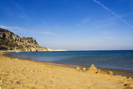 Sand castle on Tsambika (Tsampika) beach on Rhodes Island, Greeceの写真素材