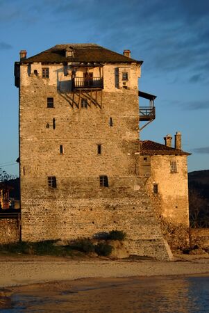 Ancient tower in Uranopolis, Greece, beautiful afternoon sun lightの写真素材