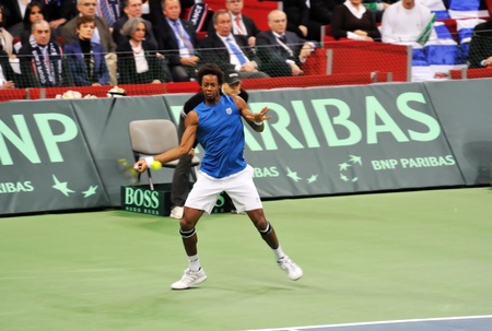 BELGRADE, SERBIA - DECEMBER 5: Gael Monfils in action at Davis Cup Final match with Novak Djokovic on December 5, 2010 in Belgrade, Serbia のeditorial素材