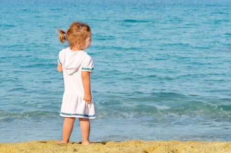 Happy child on the beach, summer vacation conceptの写真素材