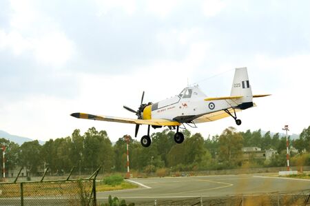 KERKIRA, GREECE- SEPTEMBER 13: PZL M18 B Dromader airplane landing to active runway at  Kerkira international airport on September 13, 2012 in Kerkira, Greeceのeditorial素材