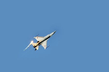 BATAJNICA, SERBIA - SEPTEMBER 2: Royal Danish Air Force F16 fighter plane releasing infrared...