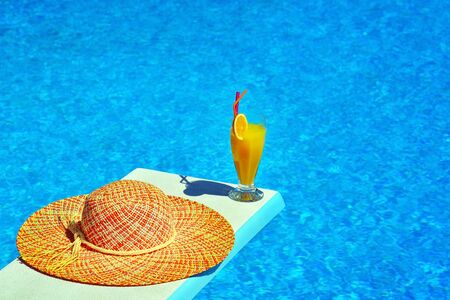 Summer vacation scene, cocktail party at swimming poolの写真素材