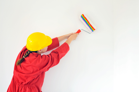 Real female painting wall, home renovation conceptの写真素材