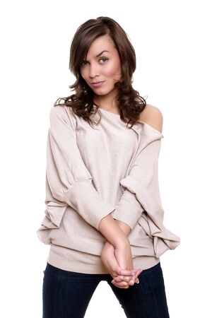 Beautiful young adult girl posing in studio on white backroundの写真素材