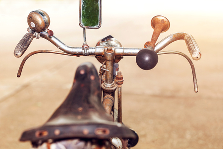 Sharpen hand retro bicycle close up detail in vintage filterの写真素材