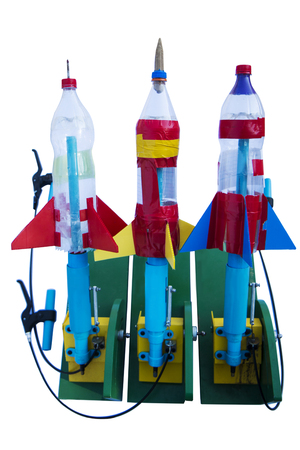close-up of colorful water bottle rocket on white backgroundの写真素材