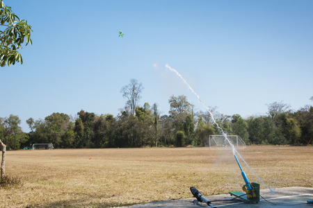 water bottle rocket blast off and water thrusting through the airの写真素材