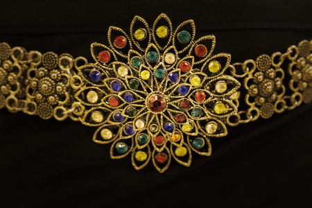 Beautiful nice shiny silver detailed handcraft belt as vintage fashion accessories for sale in a jewelry shop in Thailand with solf focusの写真素材