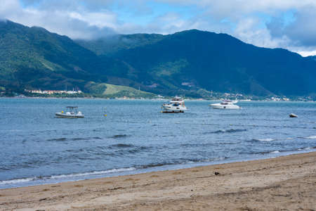 Boats on the beach on a sunny dayの写真素材