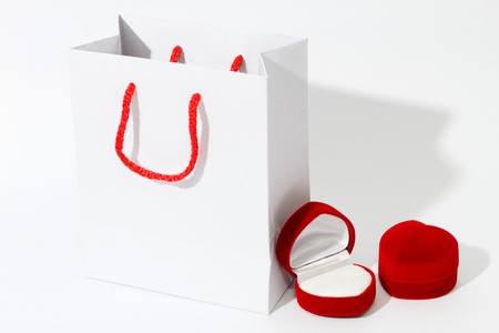 White Paper Bag and Heart Jewelry Box, White Backgroundの写真素材