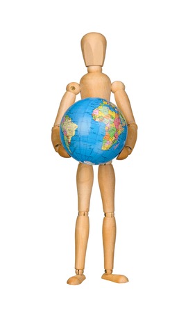 Wooden model dummy holding globe  Isolated on white  Eco concept の写真素材