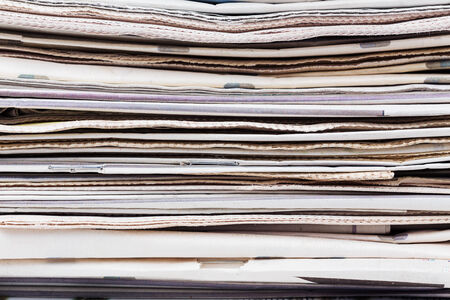 Stack of newspapers closeup shot  News and updates concept の写真素材
